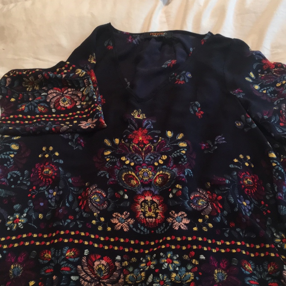 Medium Sheer multi color blouse.